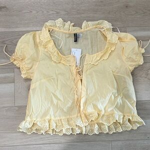 H&M Soft Yellow Lace-Up Blouse